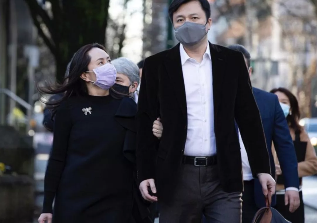 孟晚舟回國24小時后，她背后的男人火了